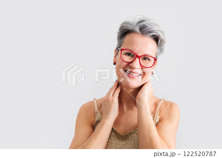 Closeup portrait of gorgeous happy middle aged mature woman, senior older 50 year lady Closeup portrait of gorgeous happy middle aged mature woman, senior older 50 year lady 122520787