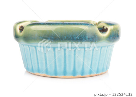 Ceramic ashtray isolated on white background Ceramic ashtray isolated on white background 122524132