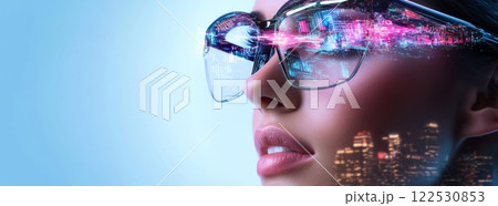 Businesswoman wearing smart glasses experiencing augmented reality in futuristic cityscape 122530853