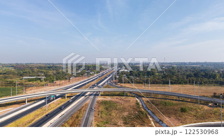 Drone shot aerial view of high angle view of intersection across the bridge against the countryside highway Drone shot aerial view of high angle view of intersection across the bridge against the countryside highway 122530968