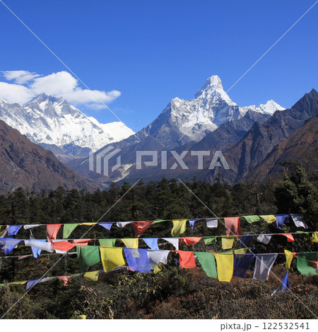 Prayer flags and Mount Lhotse and Ama Dablam, Nepal. Prayer flags and Mount Lhotse and Ama Dablam, Nepal. 122532541