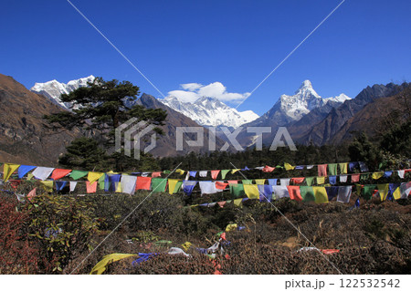 Prayer flags and Mount Everest, Lhotse and Ama Dablam, Nepal. Prayer flags and Mount Everest, Lhotse and Ama Dablam, Nepal. 122532542