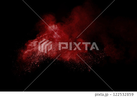 Red cloud of powdery dust is floating in the air. The image has a moody and mysterious feel to it. 122532859