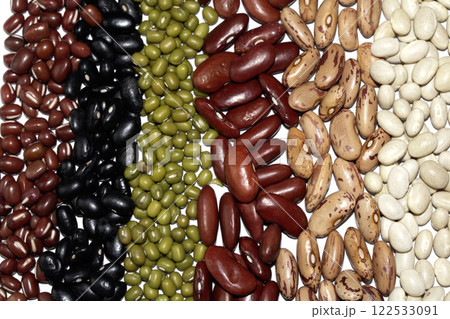 A Close Up of Dried Mixed Beans and Pulses on a White Background 122533091