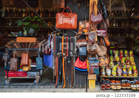 shop bags, accessories and handmade genuine leather goods at Hoi An street market in Vietnam 122533109