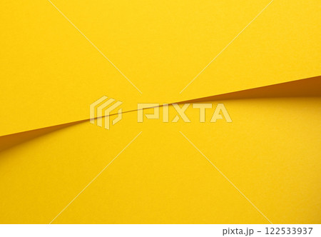 Lemon yellow paper background with a smooth matte surface and a radiant finish. Bright, sunny tones 122533937