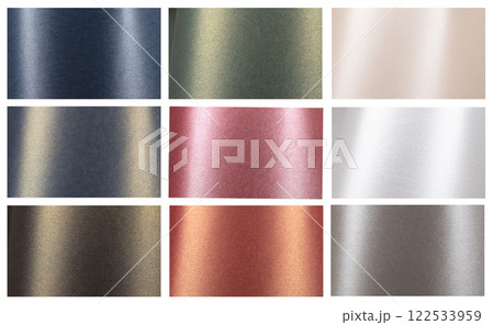 Metallic paper background featuring a gradient finish in blue, pink, green, bronze, gray, and beige. 122533959