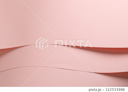 Peach pink paper background with a smooth matte finish and soft pastel tones. Subtle and refined, it Peach pink paper background with a smooth matte finish and soft pastel tones. Subtle and refined, it 122533996