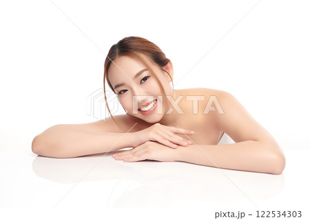 Beautiful young asian woman with clean fresh skin on white background, Face care, Facial treatment, Cosmetology, beauty and spa, Asian women portrait. Beautiful young asian woman with clean fresh skin on white background, Face care, Facial treatment, Cosmetology, beauty and spa, Asian women portrait. 122534303
