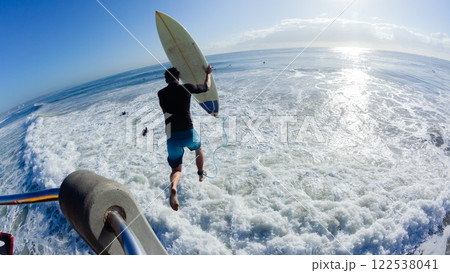 Surfer Jumping Entry Pier Ocean Surfing Surfer Jumping Entry Pier Ocean Surfing 122538041