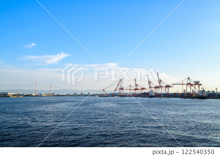 Osaka, Japan; 11 10 2024: Large cranes at Osaka port, Marine cargo, large port city and commercial center on the Japanese island Osaka, Japan; 11 10 2024: Large cranes at Osaka port, Marine cargo, large port city and commercial center on the Japanese island 122540350
