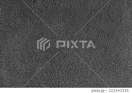 Black suede leather texture with embossed spotted pattern background, fleecy fabric texutre Black suede leather texture with embossed spotted pattern background, fleecy fabric texutre 122541555