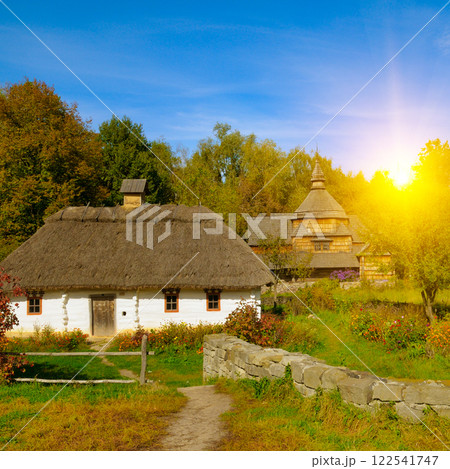 Picturesque autumn landscape in the open-air ethnographic museum. Picturesque autumn landscape in the open-air ethnographic museum. 122541747