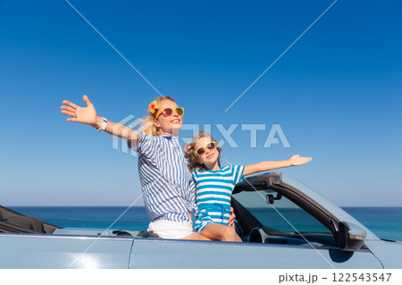 Happy family travel by car by the sea 122543547