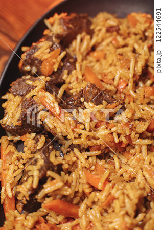 delicious pilaf with beef, beautiful food delicious pilaf with beef, beautiful food 122544691
