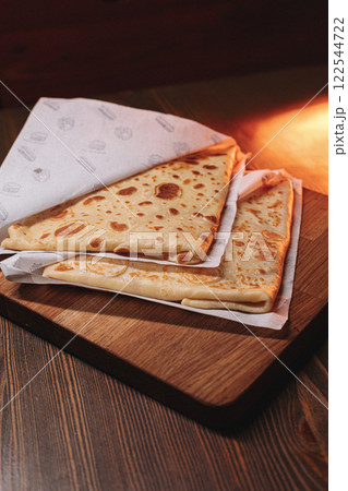 thin pancakes with ham and cheese in an envelope thin pancakes with ham and cheese in an envelope 122544722