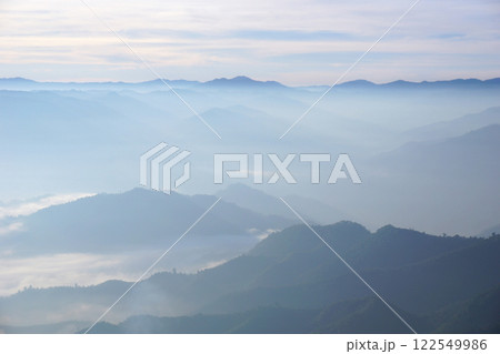 layers of mountains with fog layers of mountains with fog 122549986