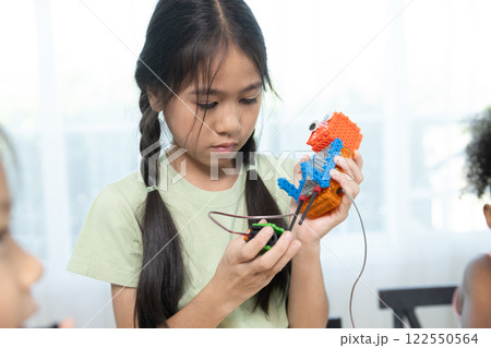 Education STEM children student in classroom. Robot assembly training, brain development, Learning electrical future engineering. 122550564