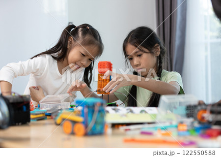 Education STEM children student in classroom. Robot assembly training, brain development, Learning electrical future engineering. Education STEM children student in classroom. Robot assembly training, brain development, Learning electrical future engineering. 122550588