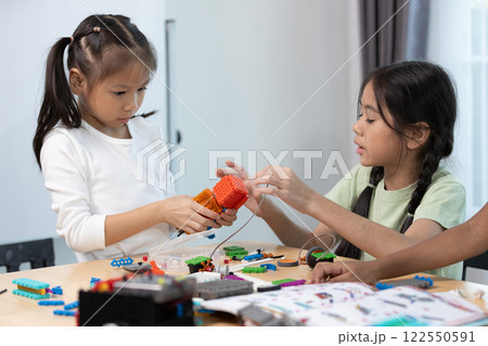 Education STEM children student in classroom. Robot assembly training, brain development, Learning electrical future engineering. 122550591
