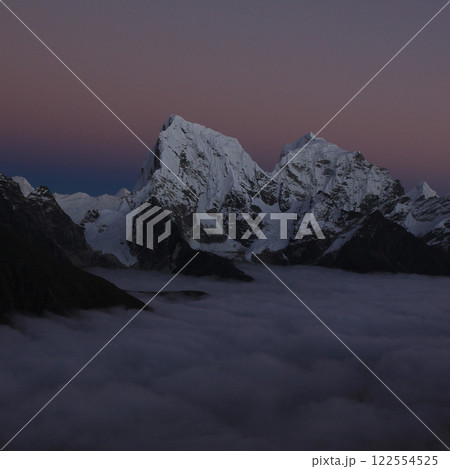 Cholatse and Taboche at sunset, sea of fog, view from Gokyo Ri, Nepal. Cholatse and Taboche at sunset, sea of fog, view from Gokyo Ri, Nepal. 122554525