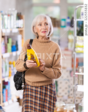 woman chooses parquet products woman chooses parquet products 122555832