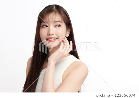 Beautiful young asian woman with clean fresh skin on white background, Face care, Facial treatment, Cosmetology, beauty and spa, Asian women portrait. Beautiful young asian woman with clean fresh skin on white background, Face care, Facial treatment, Cosmetology, beauty and spa, Asian women portrait. 122556074