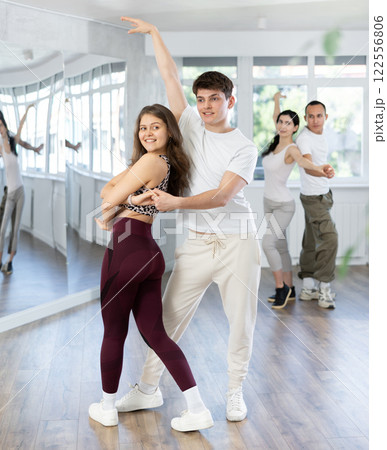 Young men and women dancing latin dances Young men and women dancing latin dances 122556806