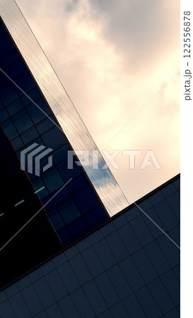 Modern Architectural Design with Dynamic Angles and Soft Sunset Glow Modern Architectural Design with Dynamic Angles and Soft Sunset Glow 122556878