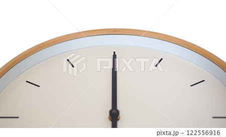 A minimalist clock with a light wooden frame, simple black hands, and no numbers, embodying clean and modern design. A minimalist clock with a light wooden frame, simple black hands, and no numbers, embodying clean and modern design. 122556916
