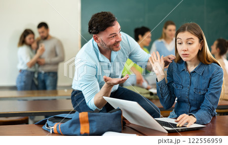 Woman student rejecting man who trying to flirt with her Woman student rejecting man who trying to flirt with her 122556959