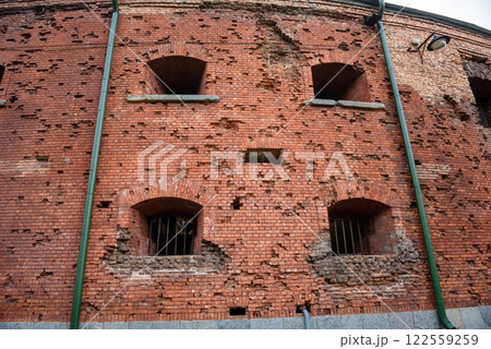 Belarus, Brest, August 2023: Red brick ruins in the Brest fortress during the war Belarus, Brest, August 2023: Red brick ruins in the Brest fortress during the war 122559259
