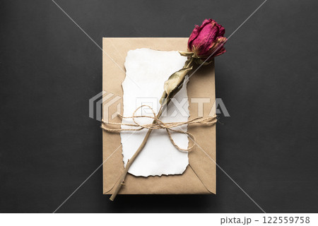 Valentine's Day - envelope for congratulations with a rose on a black background 122559758