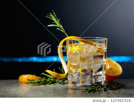 Refreshing gin-tonic cocktail with lemon and rosemary. 122562328