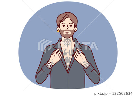 Hipster man with tattoos on body and beard on face poses in clothes for going to club or party 122562634