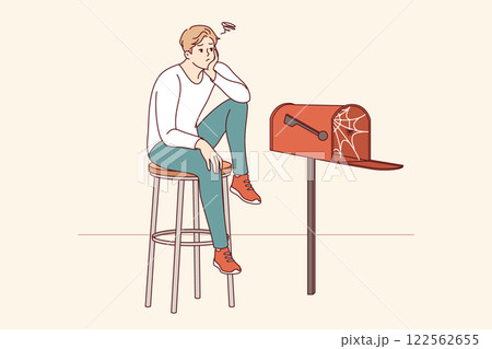 Lonely man is waiting for letter, sitting by empty mailbox covered with cobwebs. Lonely man is waiting for letter, sitting by empty mailbox covered with cobwebs. 122562655