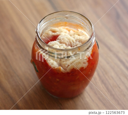 Mould and fungus on homemade canned tomato and pepper salsa sauce. Mould and fungus on homemade canned tomato and pepper salsa sauce. 122563673