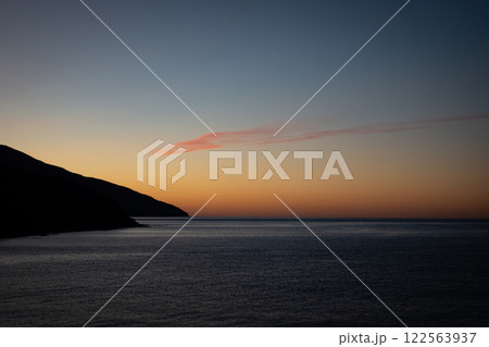 A stunning sunset over a calm Mediterranean sea. Mount Athos. Greece. 122563937