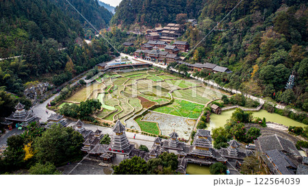 Aerial view of rice fields in front of Zhaoxing Dong Village in Guizhou, China. 122564039