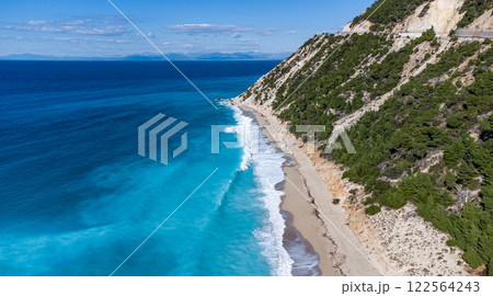 Aerial view of magnificent Tsoukalades beach. Pristine waters. Lefkada. Greece Aerial view of magnificent Tsoukalades beach. Pristine waters. Lefkada. Greece 122564243