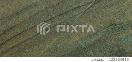 Elegant Abstract Texture with Subtle Green and Gold Tones Featuring Smooth Flowing Lines and Shimmering Finish 122564959