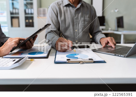 Business team present. professional investor working new start up project. tablet laptop computer with digital marketing media in virtual icon design Finance managers meeting. Business team present. professional investor working new start up project. tablet laptop computer with digital marketing media in virtual icon design Finance managers meeting. 122565391