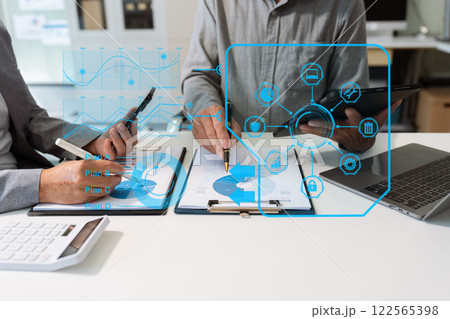 Project manager working and update tasks with milestones progress planning and professional investor working new start up project in the office. 122565398