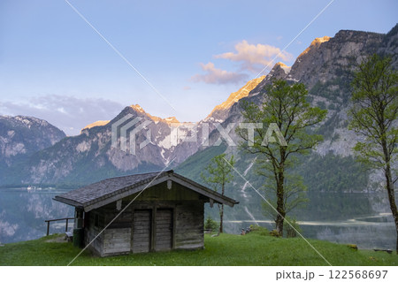Wooden house on mountain lake Koenigssee Berchtesgaden National Park Bavaria Germany Wooden house on mountain lake Koenigssee Berchtesgaden National Park Bavaria Germany 122568697