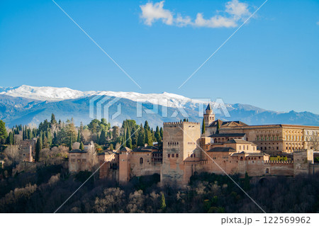 Stunning view of the Alhambra with snowcapped mountains. Granada. Spain Stunning view of the Alhambra with snowcapped mountains. Granada. Spain 122569962