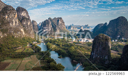 Aerial view of Yulong river near Yangshuo. Karst mountains landscape. China Aerial view of Yulong river near Yangshuo. Karst mountains landscape. China 122569963