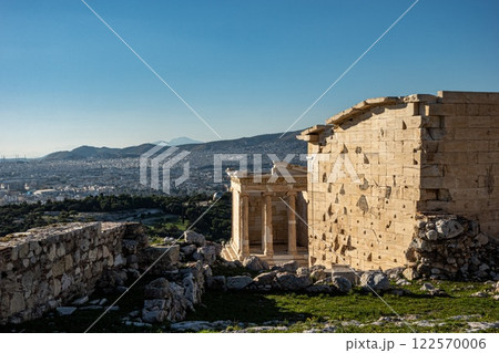 Acropolis building overlooking Athens in the background. Golden hour. Greece Acropolis building overlooking Athens in the background. Golden hour. Greece 122570006
