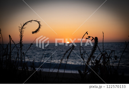 A beautiful sunset in Lefkada, Greece. Mediterranean sea. Mylos beach 122570133