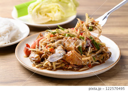 Spicy papaya salad with blue crab (Som Tum), Thai food Spicy papaya salad with blue crab (Som Tum), Thai food 122570495