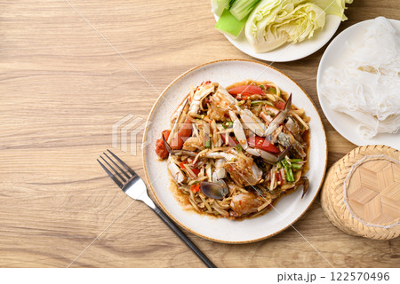 Spicy papaya salad with blue crab (Som Tum), Thai food Spicy papaya salad with blue crab (Som Tum), Thai food 122570496